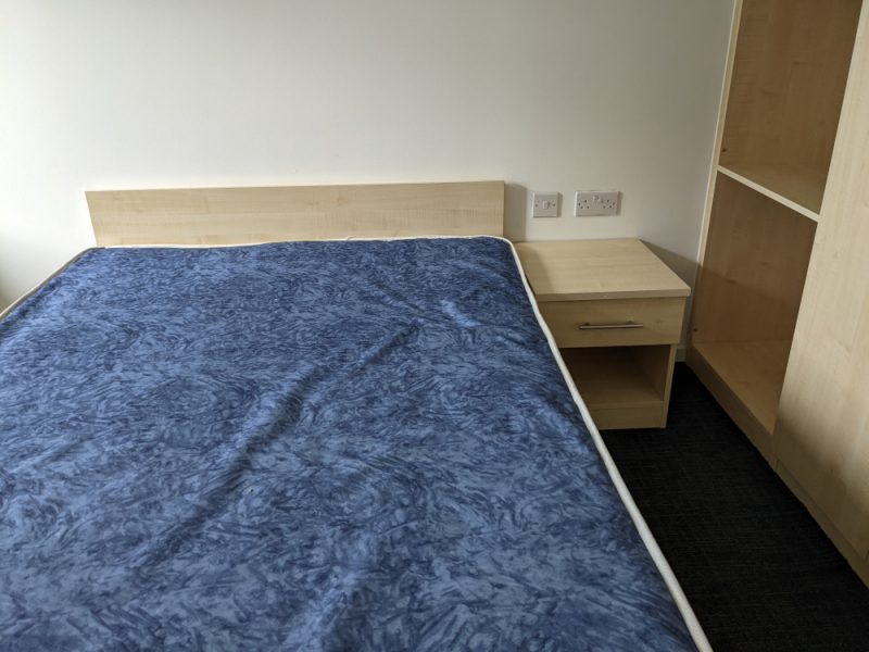 View of the bed in Carnegie village